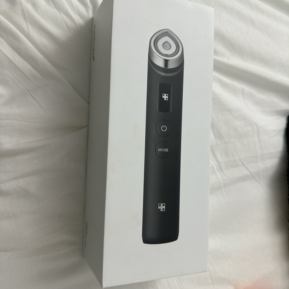 Black Facial Device